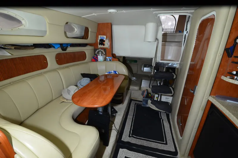 Slide: The Image of Interior of 2005 Rinker Fiesta Vee 342 yacht with seating and table. - 31