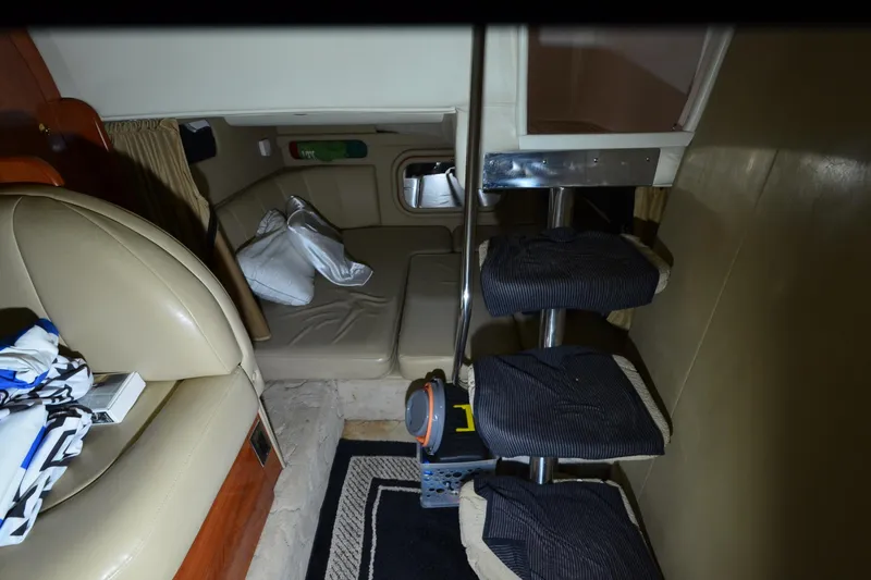 Slide: The Image of Interior cabin of 2005 Rinker Fiesta Vee 342 with seating and steps. - 32