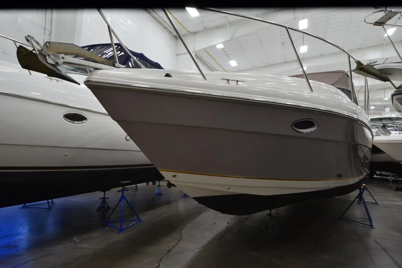 Slide: The Image of 2005 Rinker Fiesta Vee 342 boat in indoor storage, side view. - 6