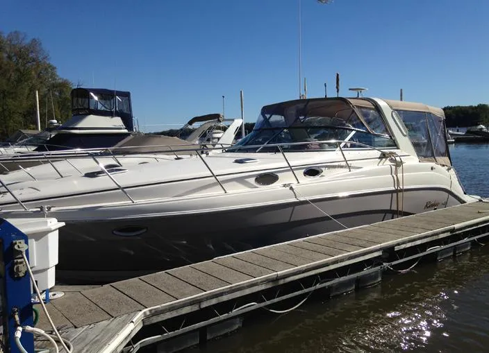 Slide: The Image of 2005 Rinker Fiesta Vee 342 docked on a sunny day. - 7