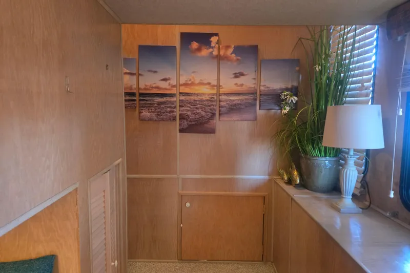 Slide: The Image of Interior of 1996 Sumerset 82'x18' Widebody with ocean artwork and decor. - 26