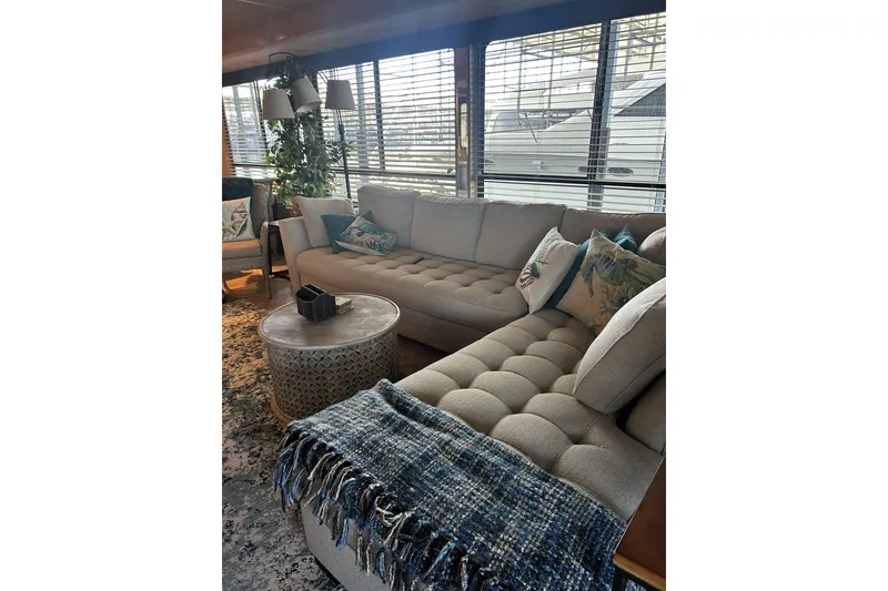 Slide: The Image of Luxurious interior of 1996 Sumerset 82'x18' Widebody with plush seating and decor. - 7