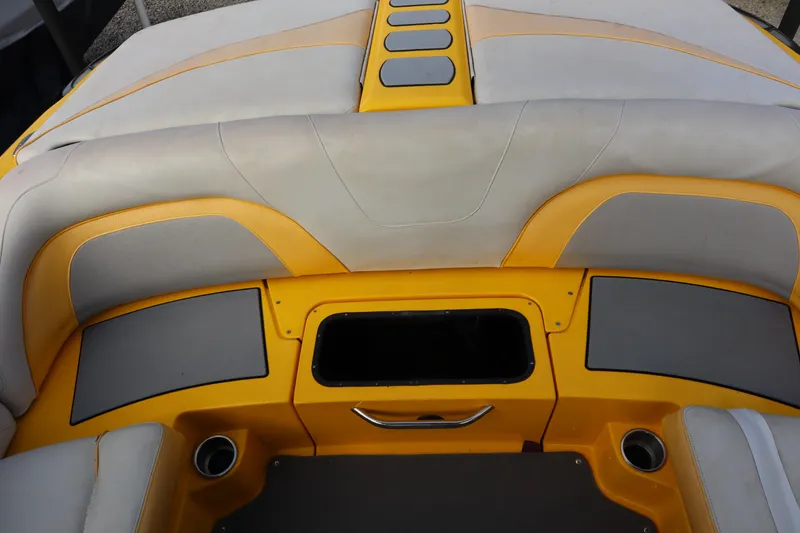 Slide: The Image of 2014 Centurion Enzo SS210 boat interior with yellow and gray seating. - 20