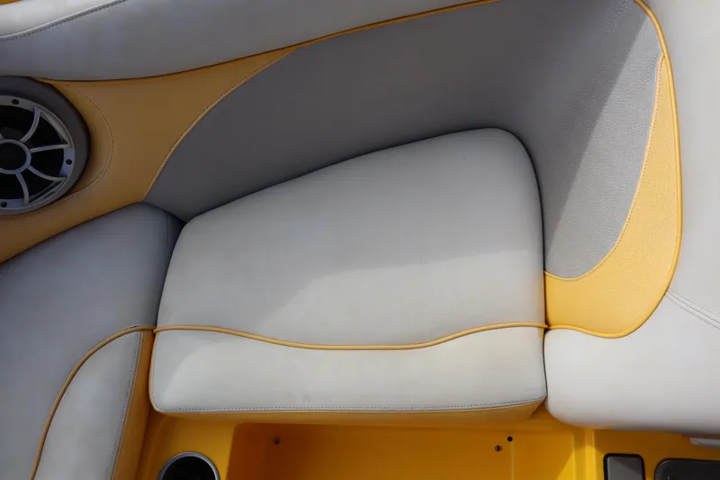 Slide: The Image of 2014 Centurion Enzo SS210 boat interior with yellow and gray upholstery. - 9