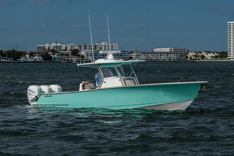 Slide: The Image of 2020 Valhalla Boatworks V-37 helm with advanced navigation system on open water. - 14