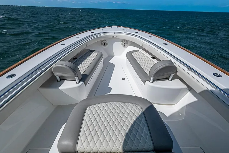 Slide: The Image of 2020 Valhalla Boatworks V-37 cruising on open water under a clear blue sky. - 21