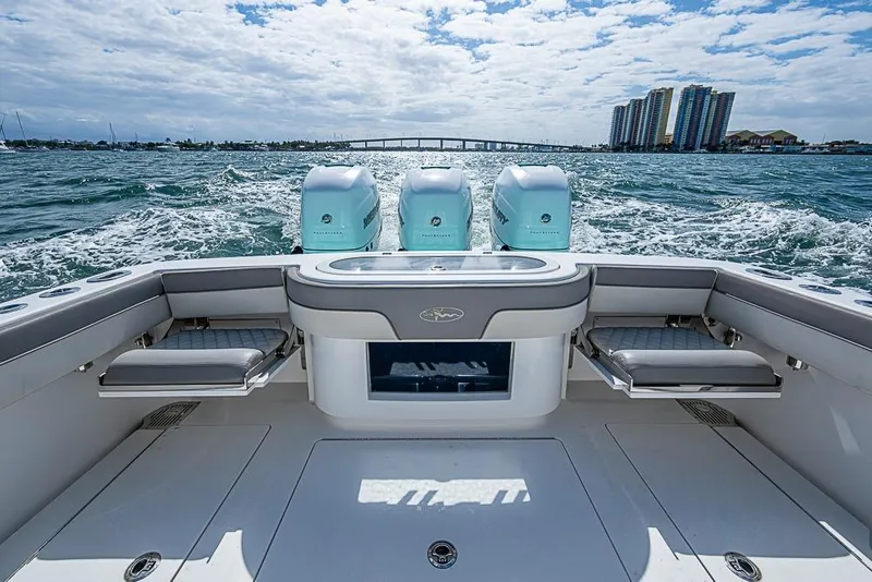 Slide: The Image of 2020 Valhalla Boatworks V-37 cruising on open water under clear blue skies. - 29