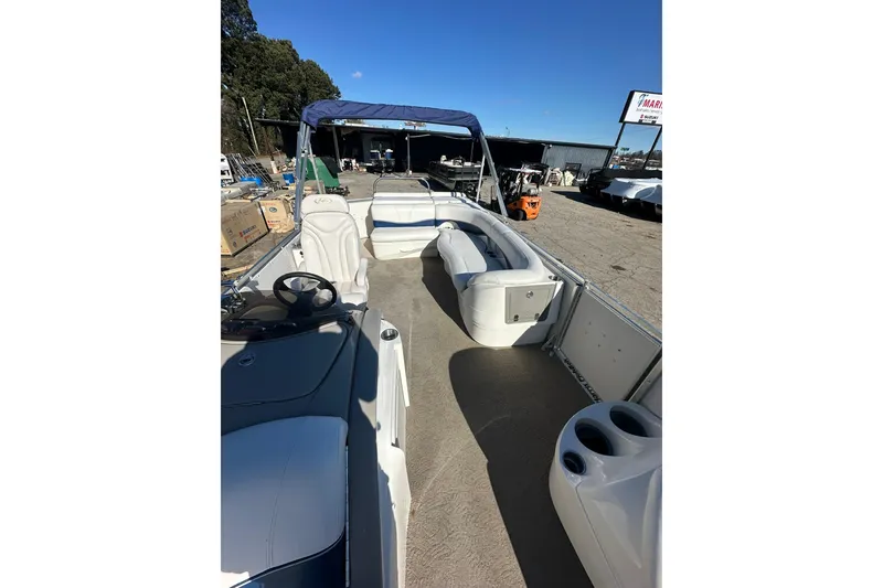 Slide: The Image of 2007 Harris Royal Heritage 260 O/B pontoon boat with spacious seating and canopy. - 10