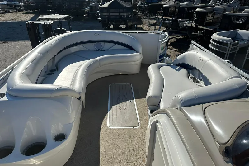Slide: The Image of 2007 Harris Royal Heritage 260 O/B pontoon boat with spacious seating and cup holders. - 7