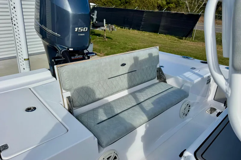 Slide: The Image of 2020 Sportsman Masters 207 Bay Boat with Yamaha 150 engine and cushioned seating. - 12