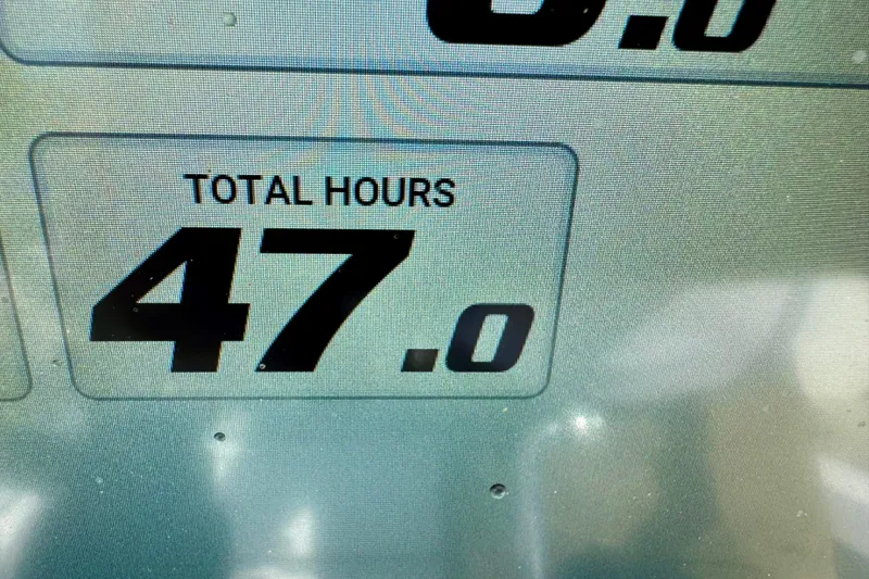 Slide: The Image of Display showing 47 total hours on 2020 Sportsman Masters 207 Bay Boat. - 17