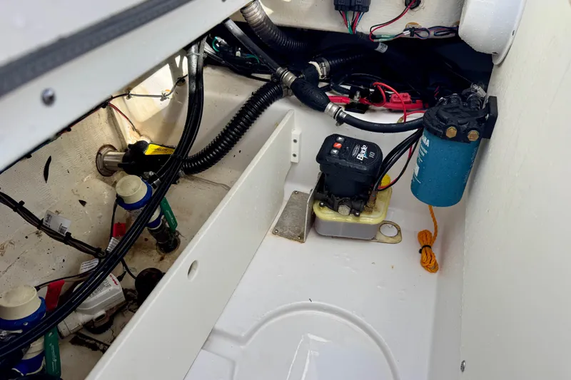 Slide: The Image of 2020 Sportsman Masters 207 Bay Boat interior wiring and components view. - 18