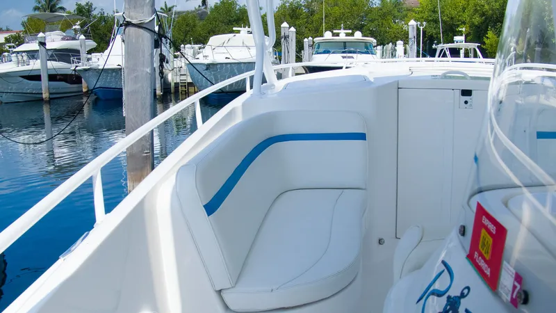 Slide: The Image of Intrepid 400 Cuddy 2017 docked with luxurious seating area. - 12