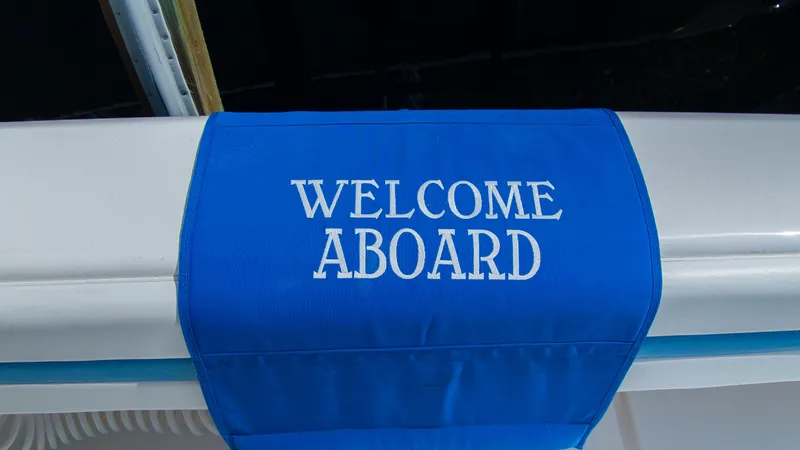 Slide: The Image of Welcome sign on Intrepid 400 Cuddy boat, year 2017. - 2