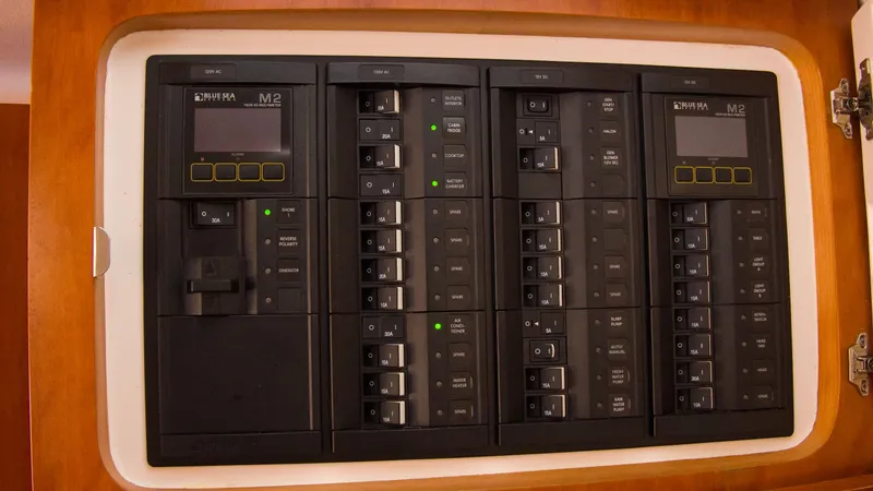 Slide: The Image of Electrical control panel of the 2017 Intrepid 400 Cuddy. - 24