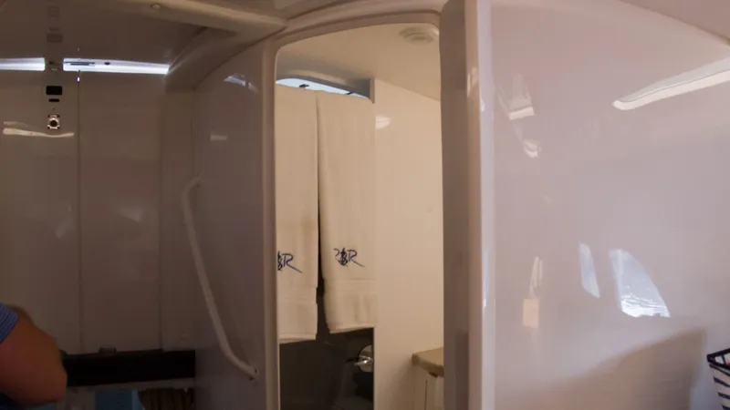 Slide: The Image of Interior of 2017 Intrepid 400 Cuddy with towels. - 29