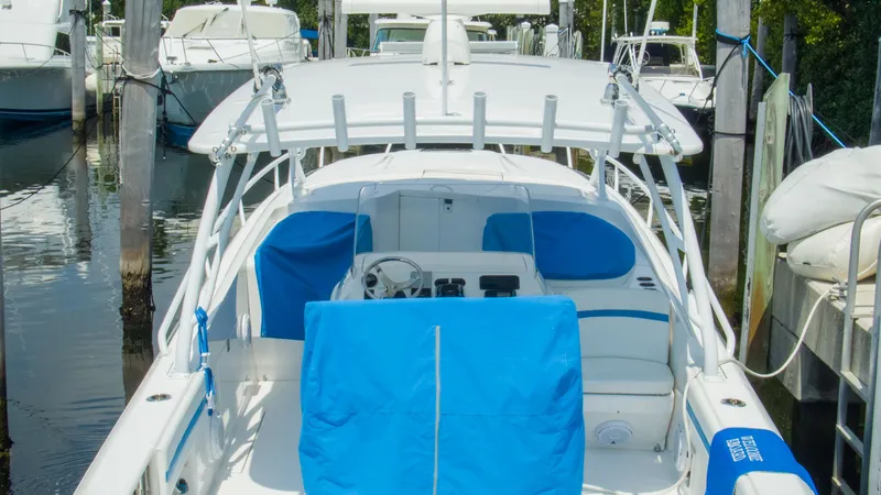 Slide: The Image of 2017 Intrepid 400 Cuddy boat docked in marina. - 30