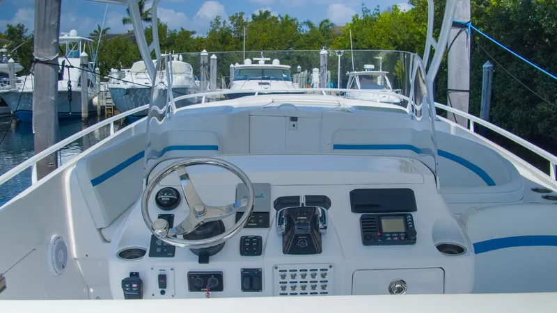 Slide: The Image of 2017 Intrepid 400 Cuddy helm station at marina. - 6