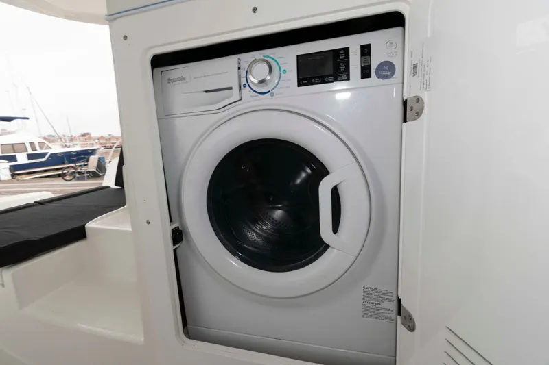 Slide: The Image of Washing machine installed on a 2019 Lagoon 42 catamaran. - 41