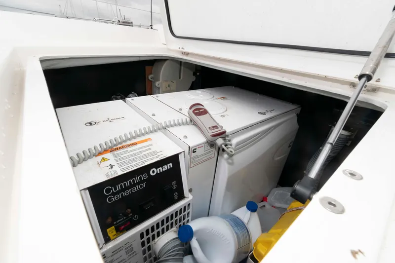 Slide: The Image of Cummins Onan generator in 2019 Lagoon 42 yacht storage compartment. - 46