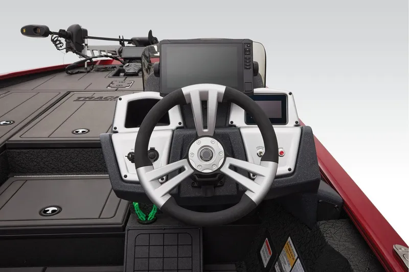 Slide: The Image of Manufacturer Provided Image: Steering console of 2026 Tracker Savage 215 boat with modern controls and display. - 27