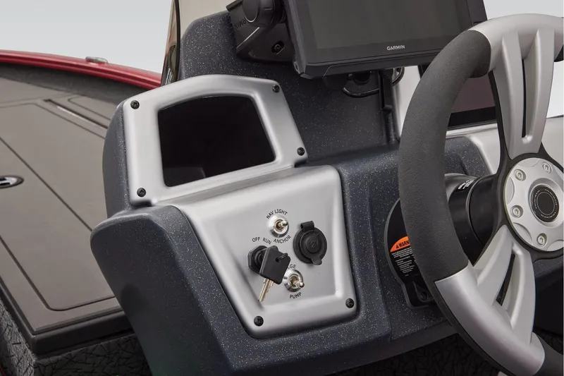 Slide: The Image of Manufacturer Provided Image: 2026 Tracker Savage 215 boat dashboard with steering wheel and control panel. - 31