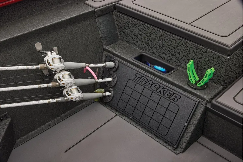 Slide: The Image of Manufacturer Provided Image: Fishing rods on a 2026 Tracker Savage 215 boat with storage compartment. - 43