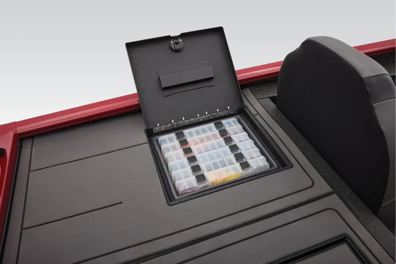 Slide: The Image of Manufacturer Provided Image: 2026 Tracker Savage 215 boat storage compartment with organized tackle boxes. - 45