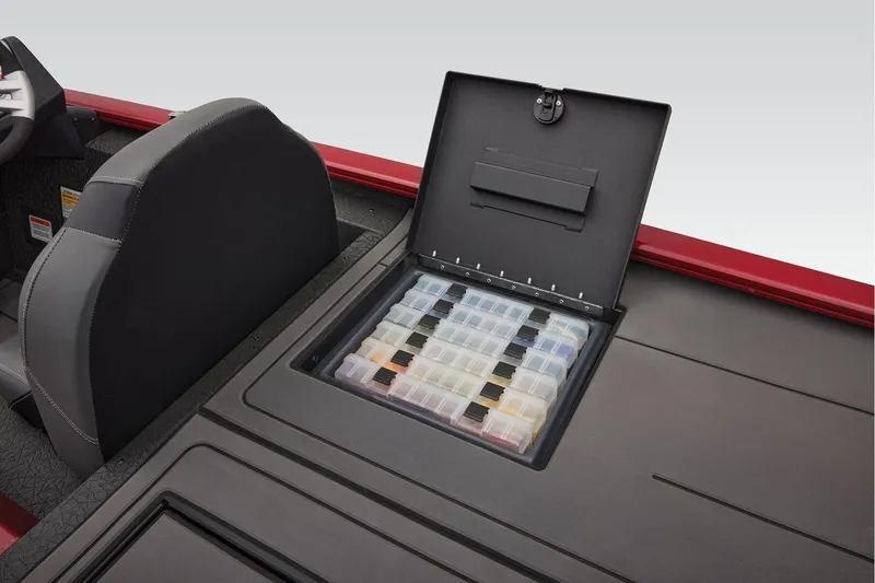 Slide: The Image of Manufacturer Provided Image: 2026 Tracker Savage 215 boat with open storage compartment and organized tackle boxes. - 46