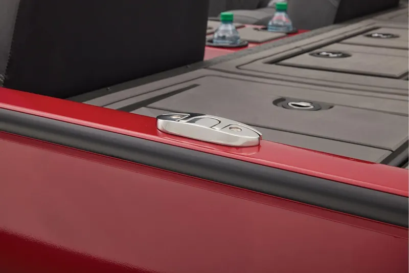 Slide: The Image of Manufacturer Provided Image: 2026 Tracker Savage 215 boat interior with red trim and storage compartments. - 49