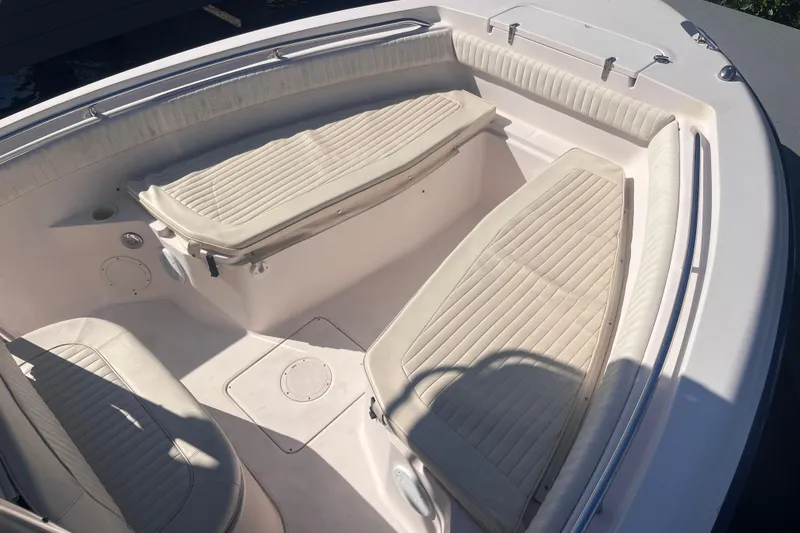 Slide: The Image of 2006 Grady-White Release 283 boat interior with cushioned seating. - 20