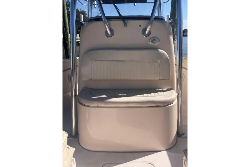 Slide: The Image of 2006 Grady-White Release 283 boat seat with stainless steel frame in sunlight. - 24