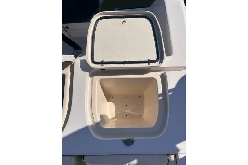 Slide: The Image of Open storage compartment on 2006 Grady-White Release 283 boat. - 39
