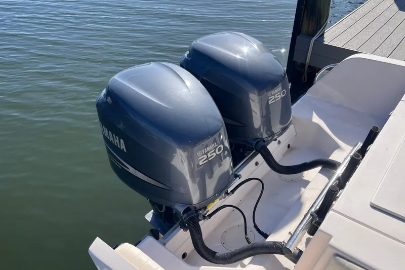 Slide: The Image of Twin Yamaha 250 outboard engines on a 2006 Grady-White Release 283 boat. - 6