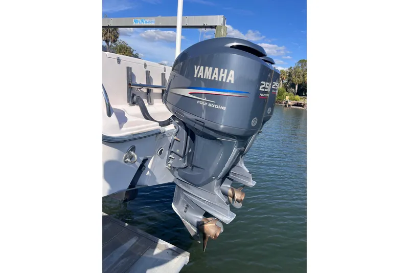 Slide: The Image of 2006 Grady-White Release 283 with Yamaha 250 outboard motor on water. - 7