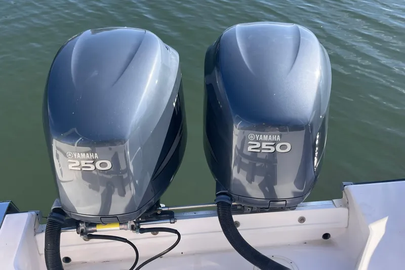 Slide: The Image of Twin Yamaha 250 outboard engines on a 2006 Grady-White Release 283 boat. - 9