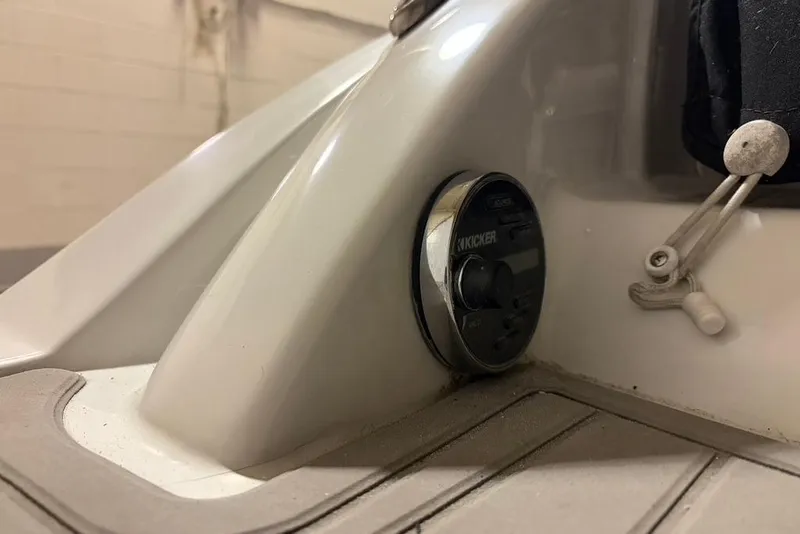 Slide: The Image of Close-up of 2019 Crownline 264 CR boat audio control panel. - 34