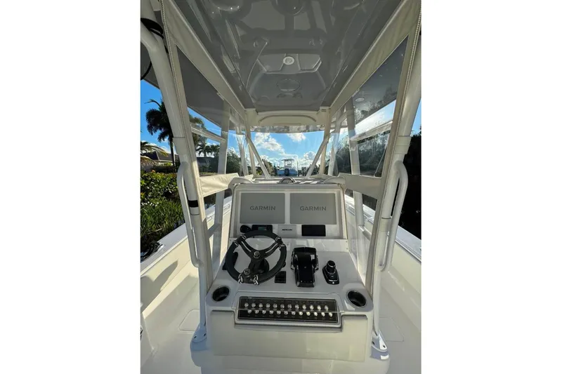 Slide: The Image of 2024 Invincible 33 Open Fisherman boat console with Garmin navigation system. - 4