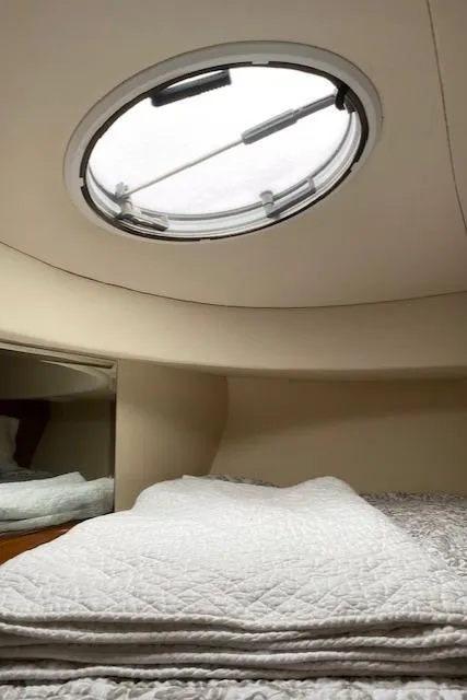 Slide: The Image of Interior cabin of 2007 Silverton 33 Convertible yacht with round skylight. - 29
