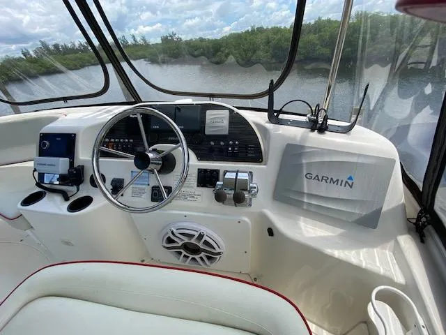 Slide: The Image of 2007 Silverton 33 Convertible boat helm with Garmin navigation system. - 42