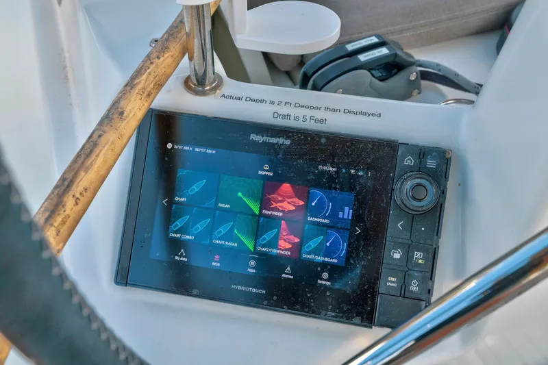 Slide: The Image of Navigation system on Jeanneau Sun Odyssey 440, 2021 model, displaying charts and radar. - 31