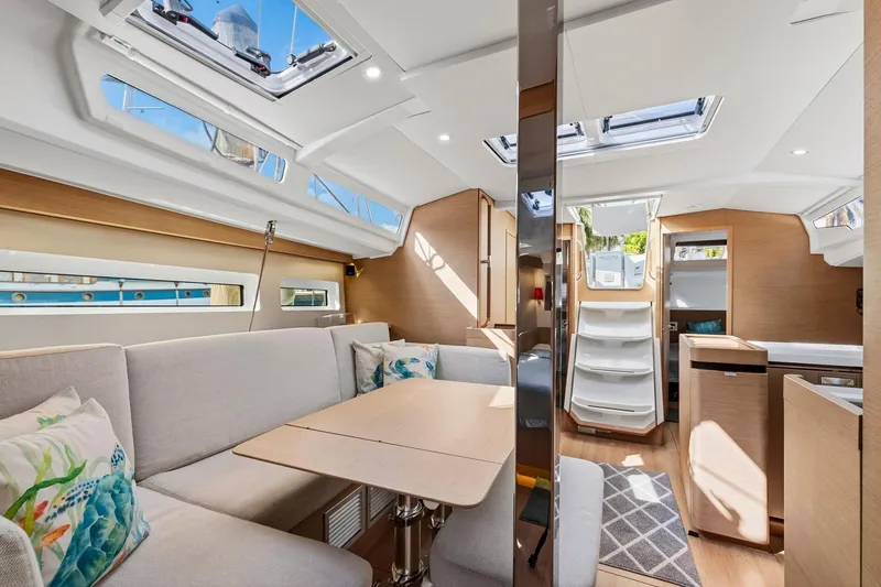 Slide: The Image of Luxurious interior of 2021 Jeanneau Sun Odyssey 440 sailboat with modern design and ample natural light. - 33
