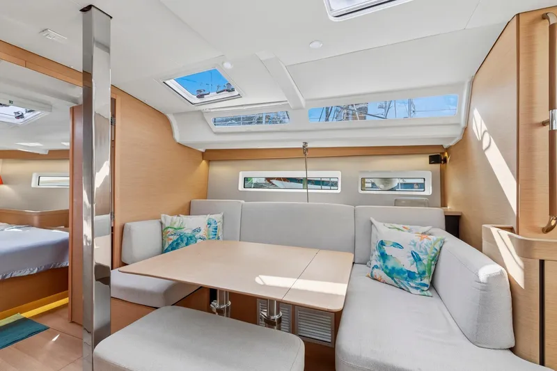 Slide: The Image of Modern interior of 2021 Jeanneau Sun Odyssey 440 yacht with cozy seating and natural light. - 34