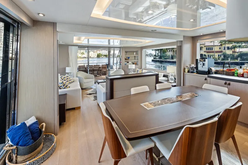 Slide: The Image of Luxurious interior of 2019 Sunseeker 86 Yacht with elegant dining and seating areas. - 12