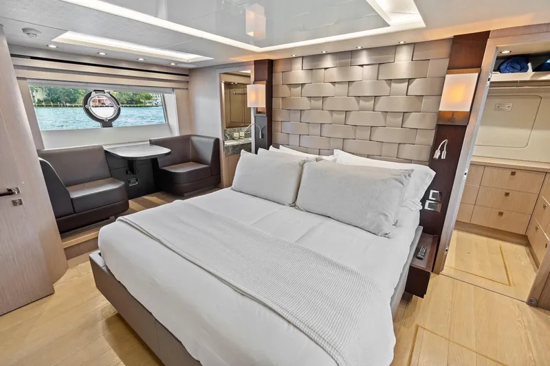 Slide: The Image of Luxurious bedroom interior of 2019 Sunseeker 86 Yacht with modern design and scenic window view. - 21