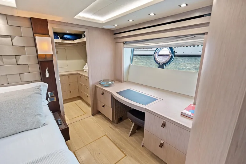 Slide: The Image of Luxurious interior of 2019 Sunseeker 86 Yacht with elegant wood finish and ocean view. - 23