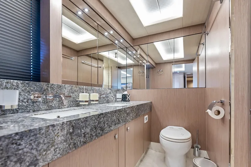 Slide: The Image of Luxurious bathroom in 2019 Sunseeker 86 Yacht with granite countertop and modern fixtures. - 25
