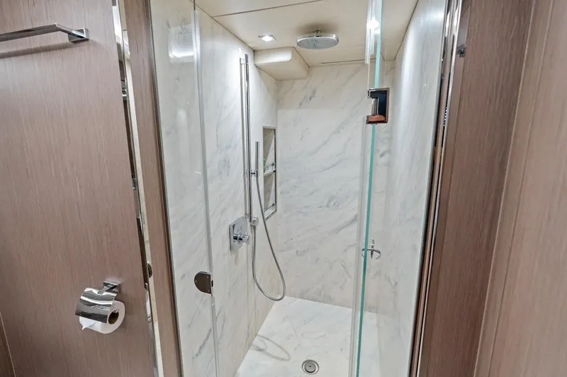 Slide: The Image of Luxurious shower in 2019 Sunseeker 86 Yacht with marble walls and modern fixtures. - 26