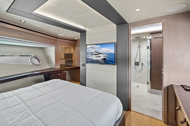 Slide: The Image of Luxurious Sunseeker 86 Yacht 2019 bedroom with modern decor and ensuite bathroom. - 28