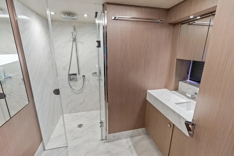Slide: The Image of Luxurious bathroom on 2019 Sunseeker 86 Yacht with marble shower and modern fixtures. - 29